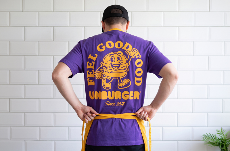 Unburger team member preparing vegan burgers in the Dearborn kitchen